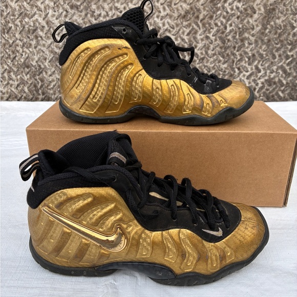 gold foamposite grade school